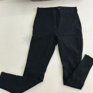 Women’s size small black stretch jeggings. Super skinny. Almost new.